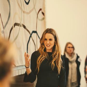Speaking to members at a Boss Moms event