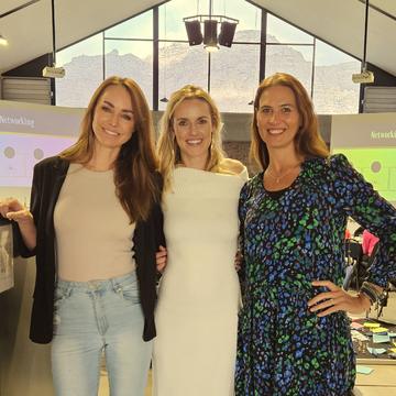 Three members at a networking event