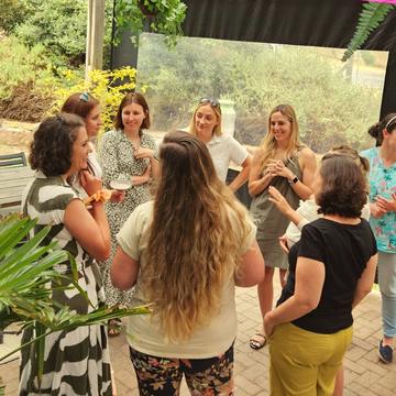 Members chatting on a patio