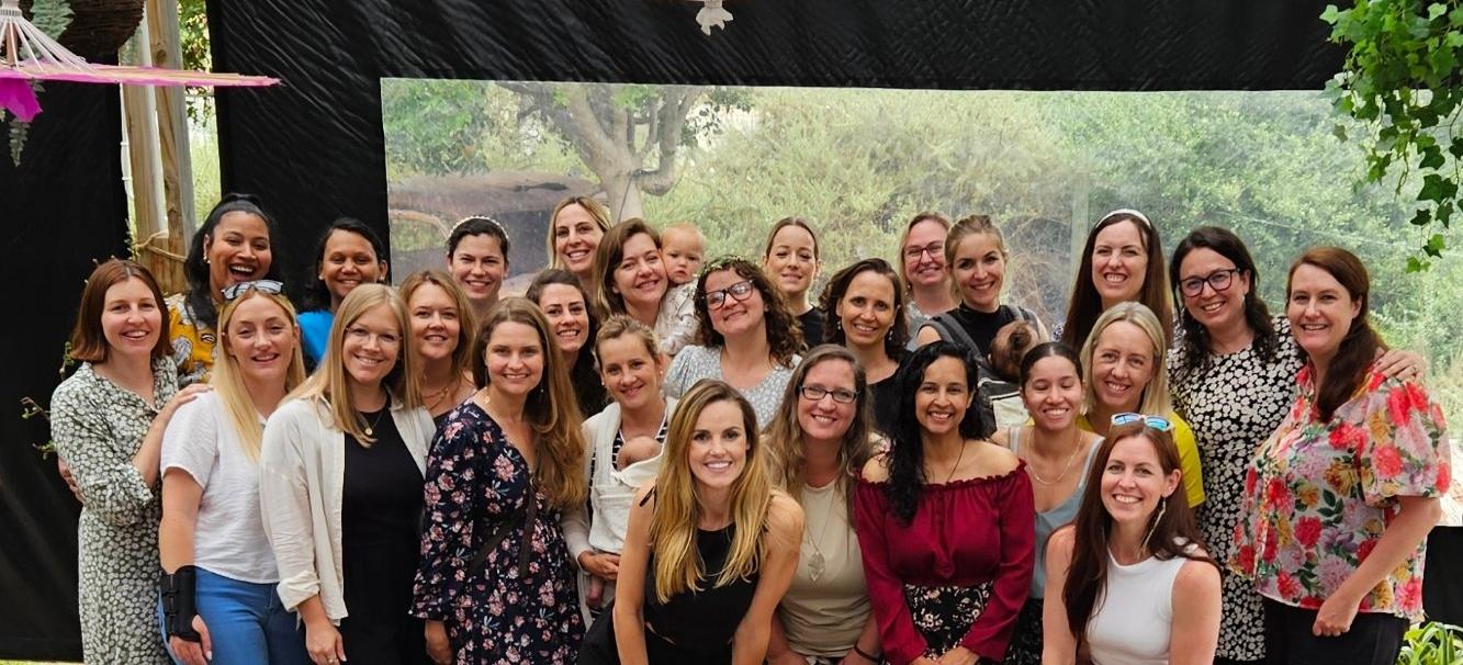 A big group of Boss Moms members together at a meetup