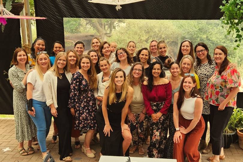 A big Boss Moms group photo at a meetup