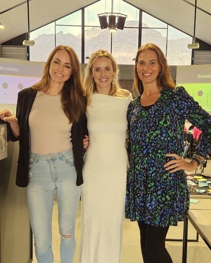 Three members at a Boss Moms networking event